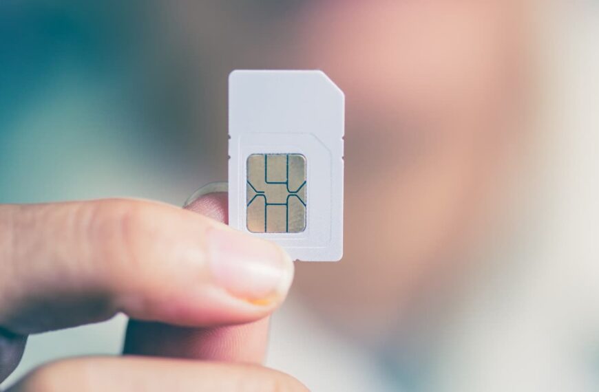 holding a sim card